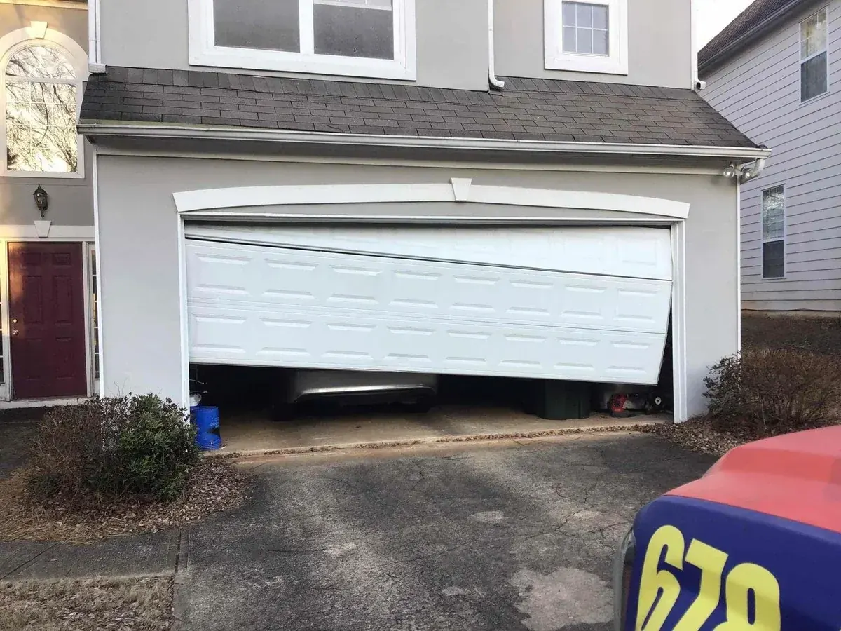 Garage door off-track door repair in Olathe